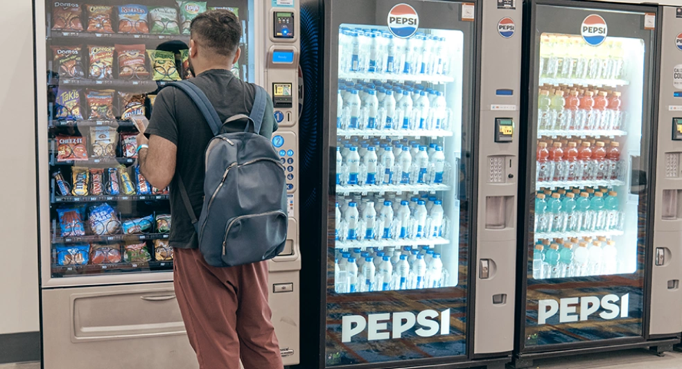 Vending customer viewing items in a machine